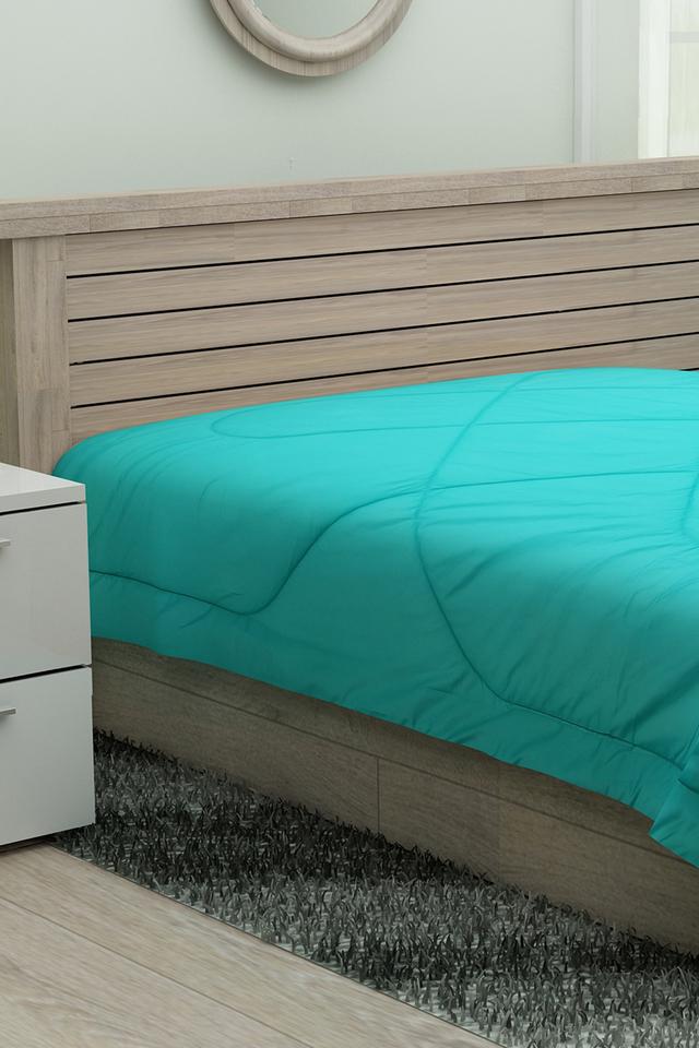 Buy PORTICO Solid Reversible Double Quilt Shoppers Stop