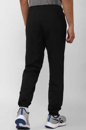 Buy REEBOK Printed Polyester Regular Fit Men s Track Pant
