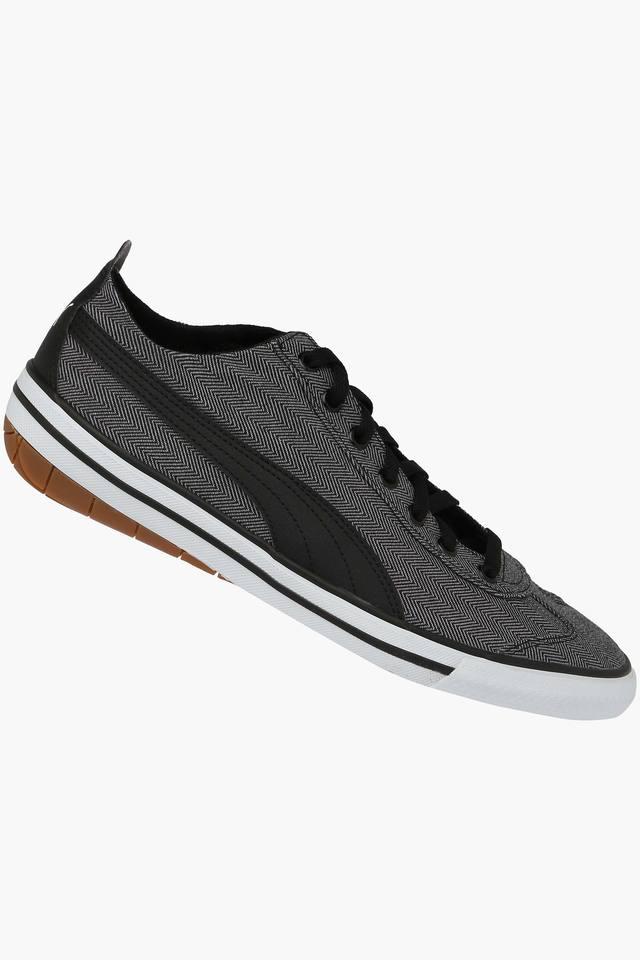 Puma black canvas discount shoes