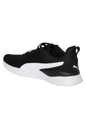 Puma black and 2024 white sport shoes