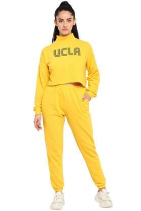 Womens yellow 2024 nike tracksuit