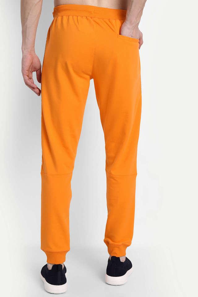 Orange warm up deals pants