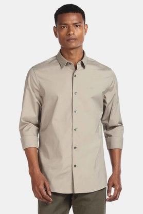 Calvin Klein Jeans Men Solid Casual Beige Shirt - Buy Calvin Klein