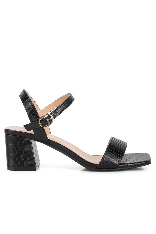 KHAITE Stagg Heel Sandals in Black | FWRD