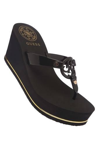 guess black wedges