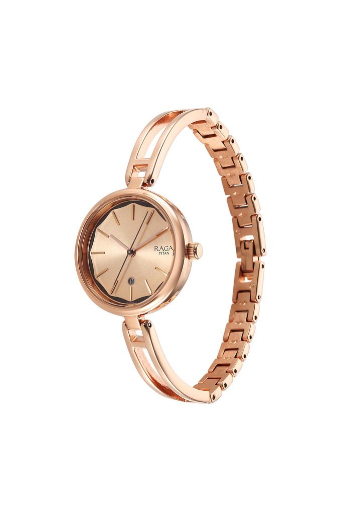 Amazon.com: TITAN Raga Women's Bracelet Dress Watch with Swarovski Crystals  - Quartz, Water Resistant - Gold Band and Gold Dial : Clothing, Shoes &  Jewelry