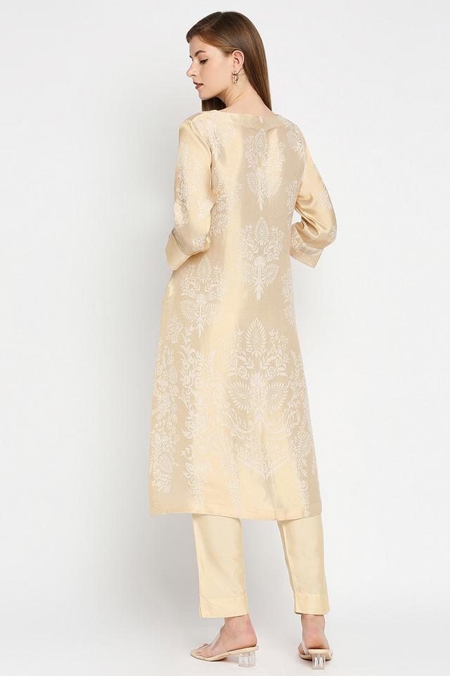 Details more than 170 golden white kurti