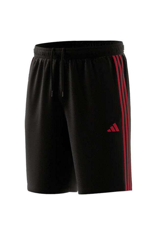 Black adidas shorts store with red stripes