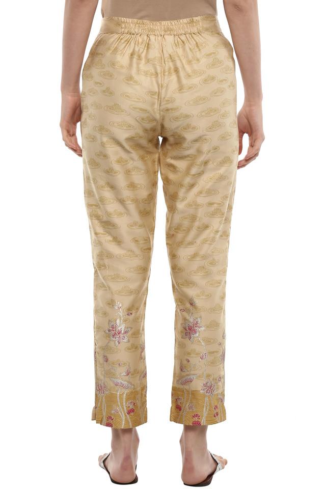 Ivory Floral Stay For A While Printed Trousers | JLUXLABEL