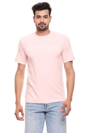 pink t shirt and jeans