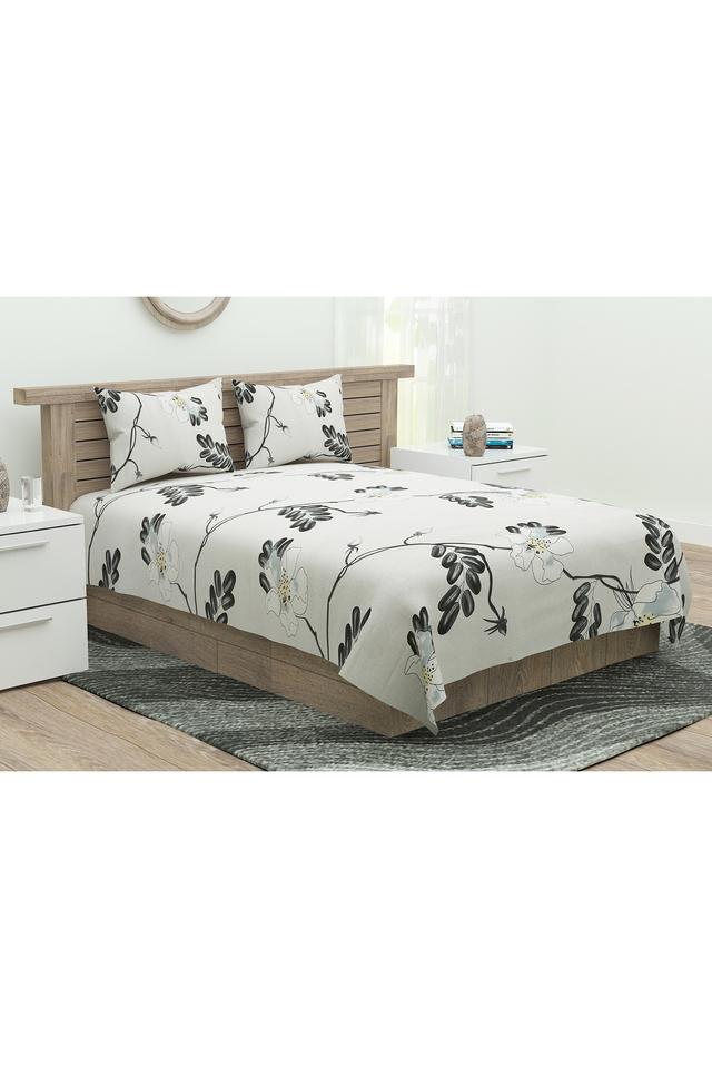 Plain bed sheets shop with printed pillow covers