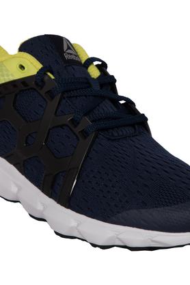 Reebok men's gusto sales running shoes