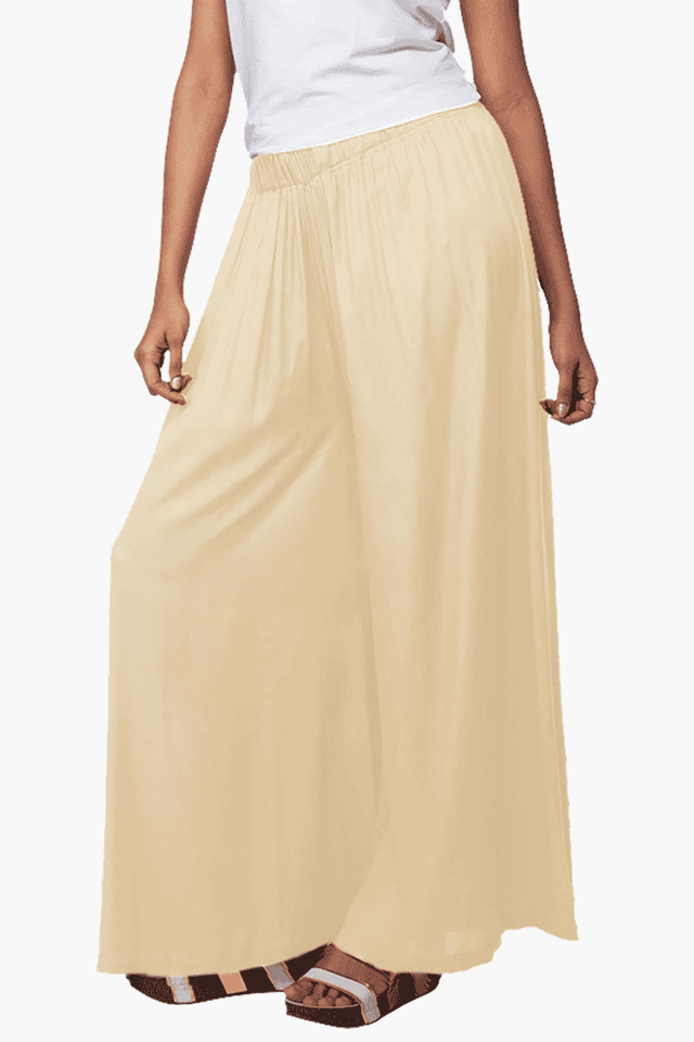 Buy GO COLORS Beige Womens Mid Rise Solid Flared Palazzo Pant