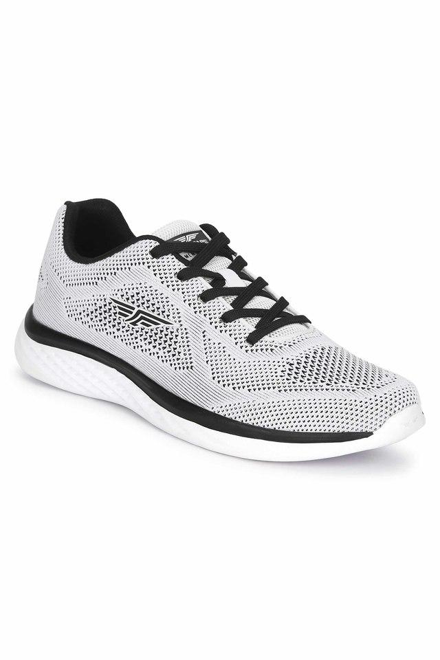 Red tape best sale white sports shoes