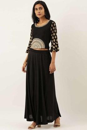 Black skirt cheap golden top