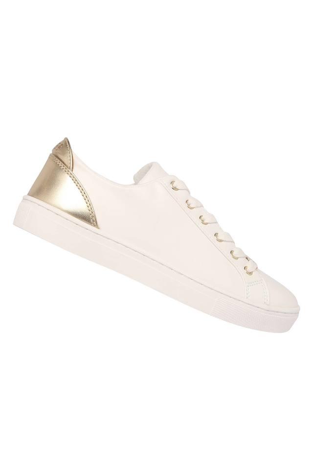 Guess white best sale and gold trainers