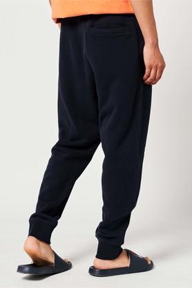 Adidas originals xbyo track pants in navy hotsell