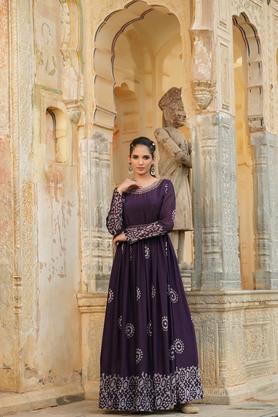 Dark magenta cotton anarkali suit in floral and tribal print only