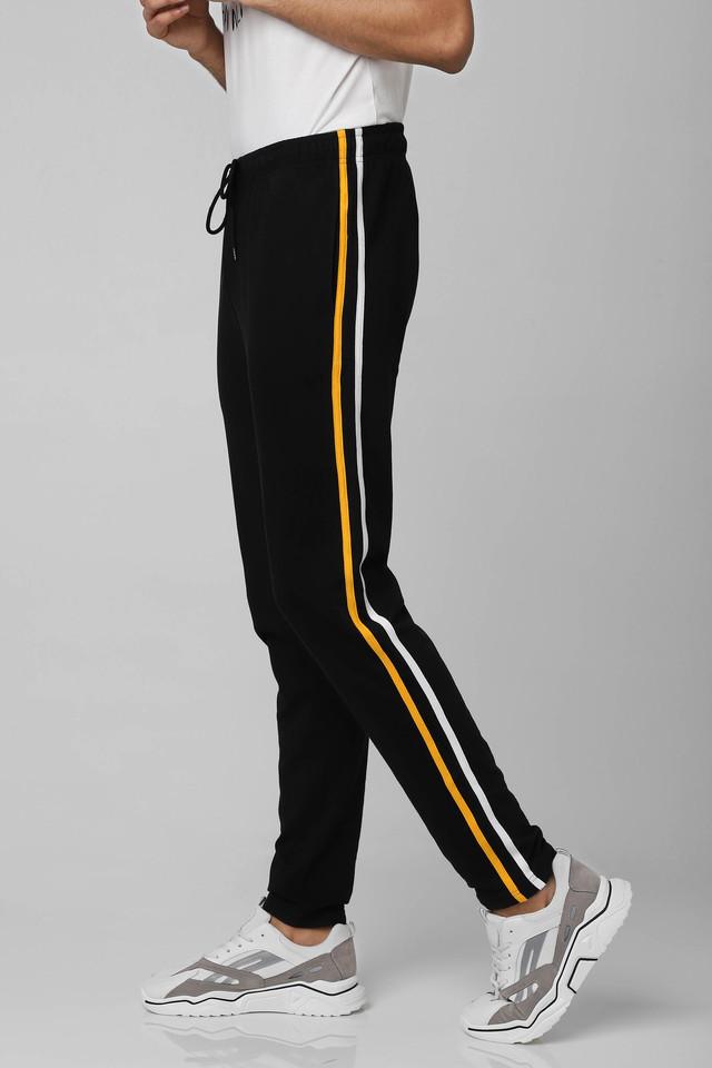 Buy HERENOW Men Black  Yellow Colourblocked Joggers  Track Pants for Men  9018181  Myntra