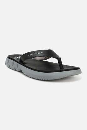 Buy REEBOK Synthetic Slip on Men s Athleisure Slippers Shoppers Stop