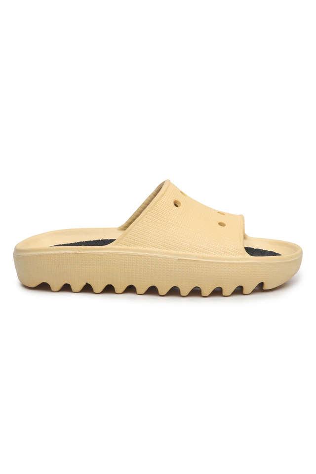 Cream best sale flip flops
