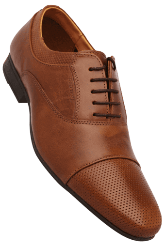 where are red tape shoes made