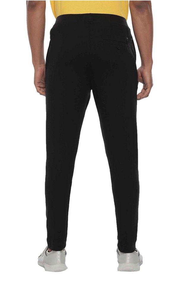 Nike Men's Therma-FIT Tapered Track Pants • Price »