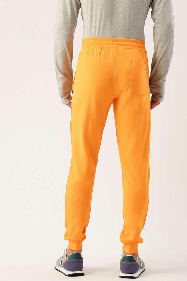 Orange store track pants