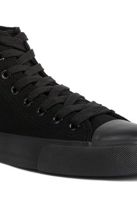 Nike canvas hot sale high tops