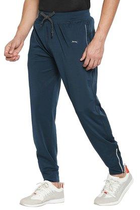 Nike blue hotsell polyester lycra trackpants