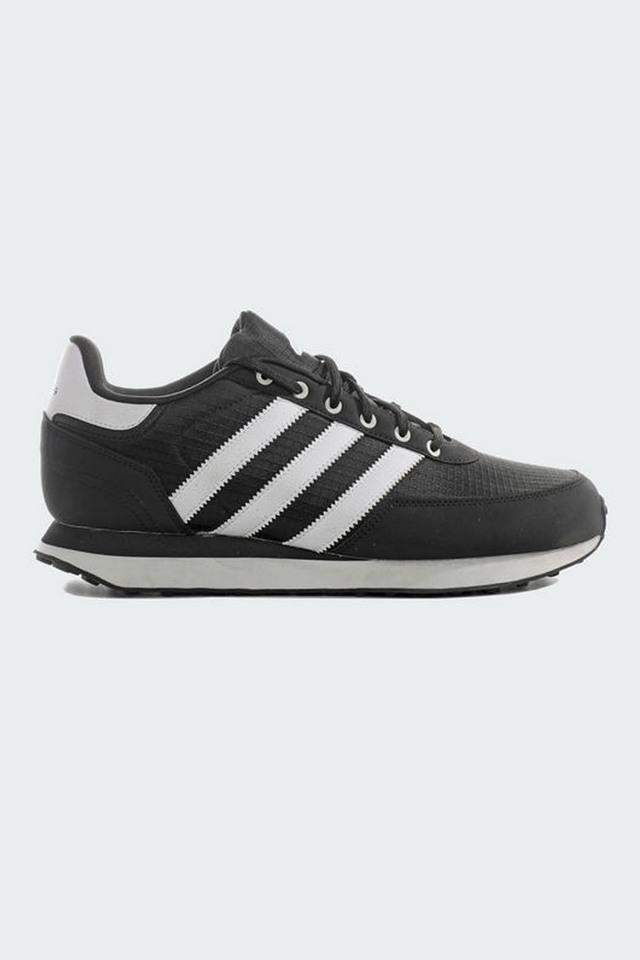 Adidas black low tops hotsell