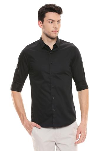 jeans on black shirt