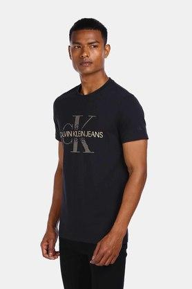 Calvin Klein Jeans Solid Men Polo Neck Black T-Shirt - Buy Calvin