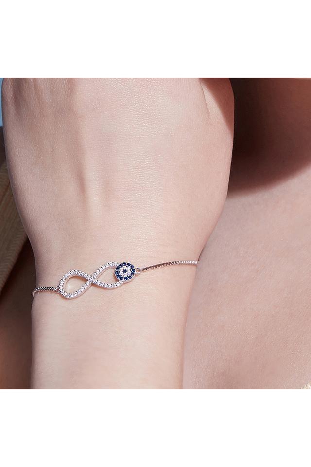 Evil Eye Expandable Bangle Charm Bracelet in Gold. BellaRyann.com